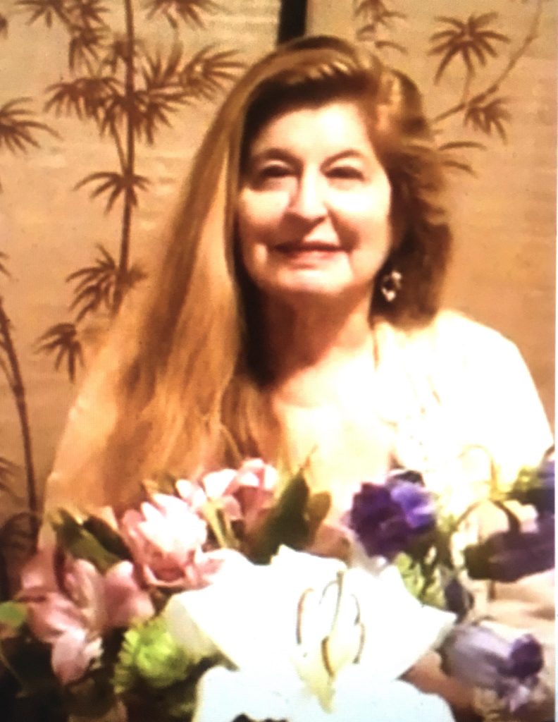 Miriam Belov with autumn flowers