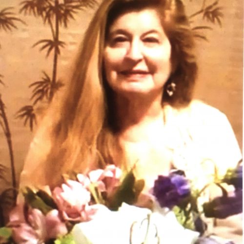 Miriam Belov with autumn flowers