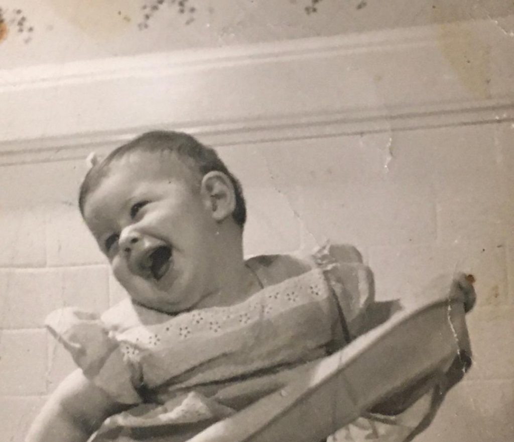 baby Miriam smiling