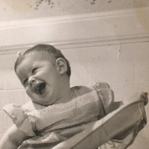 baby Miriam smiling